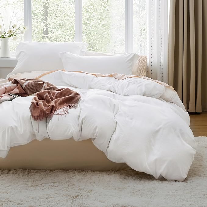 Bedsure Prewashed Duvet Cover, Queen, in white — the bedding set photographed flat with pillowcases alongside.